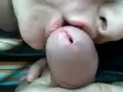 My thick rod's head is sensuously kissed by my adorable wife.